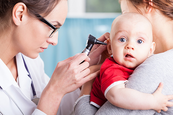 image of baby being examined