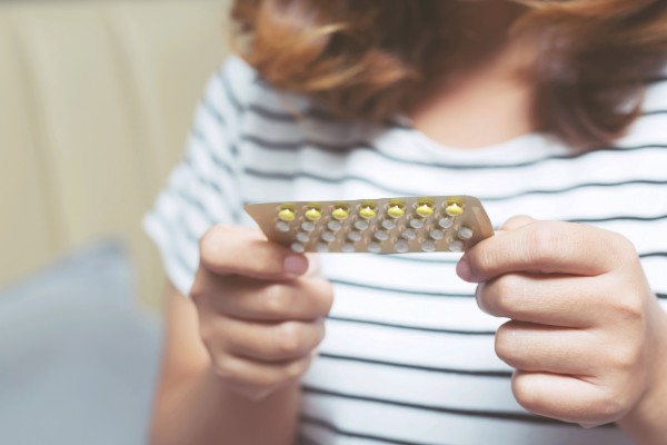 Image of a person with oral contraception