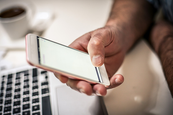 image depicting patient receiving a text