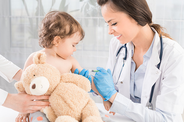 image of baby being given a vaccination